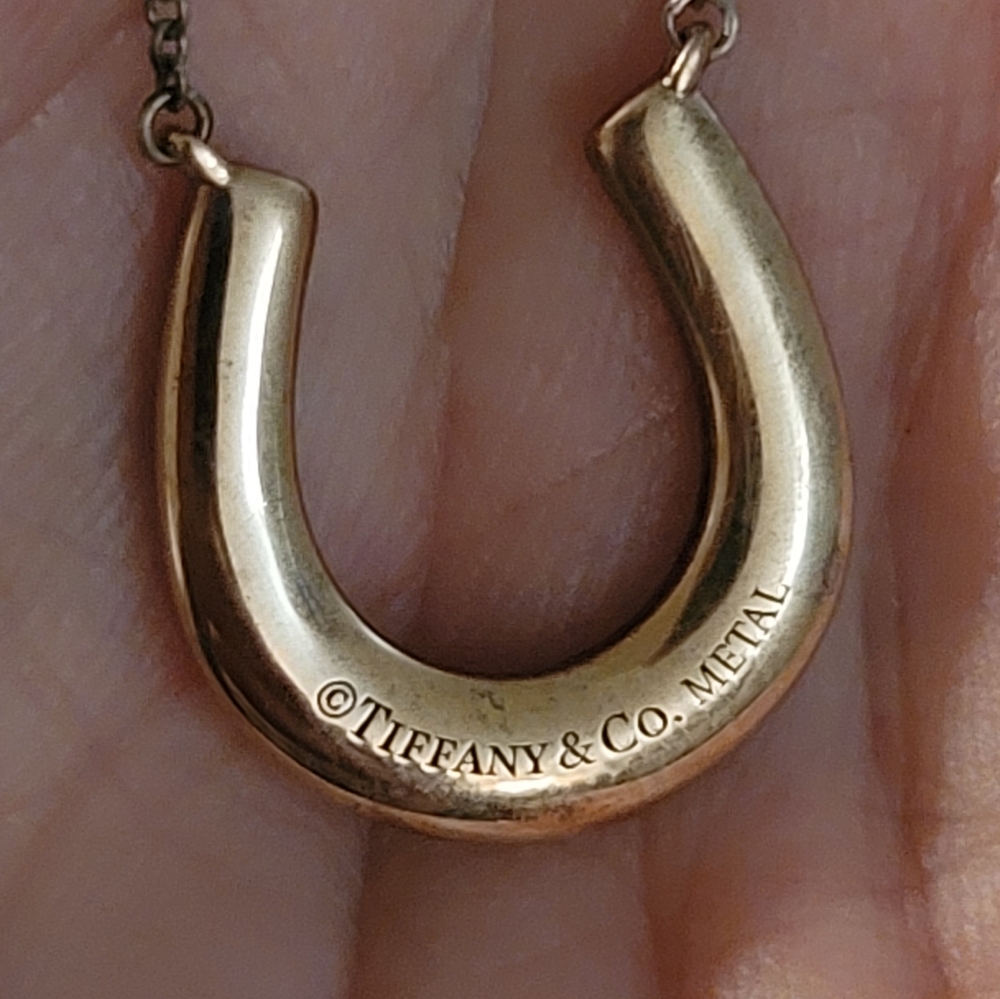 Tiffany & Co. Horseshoe rose gold necklace.